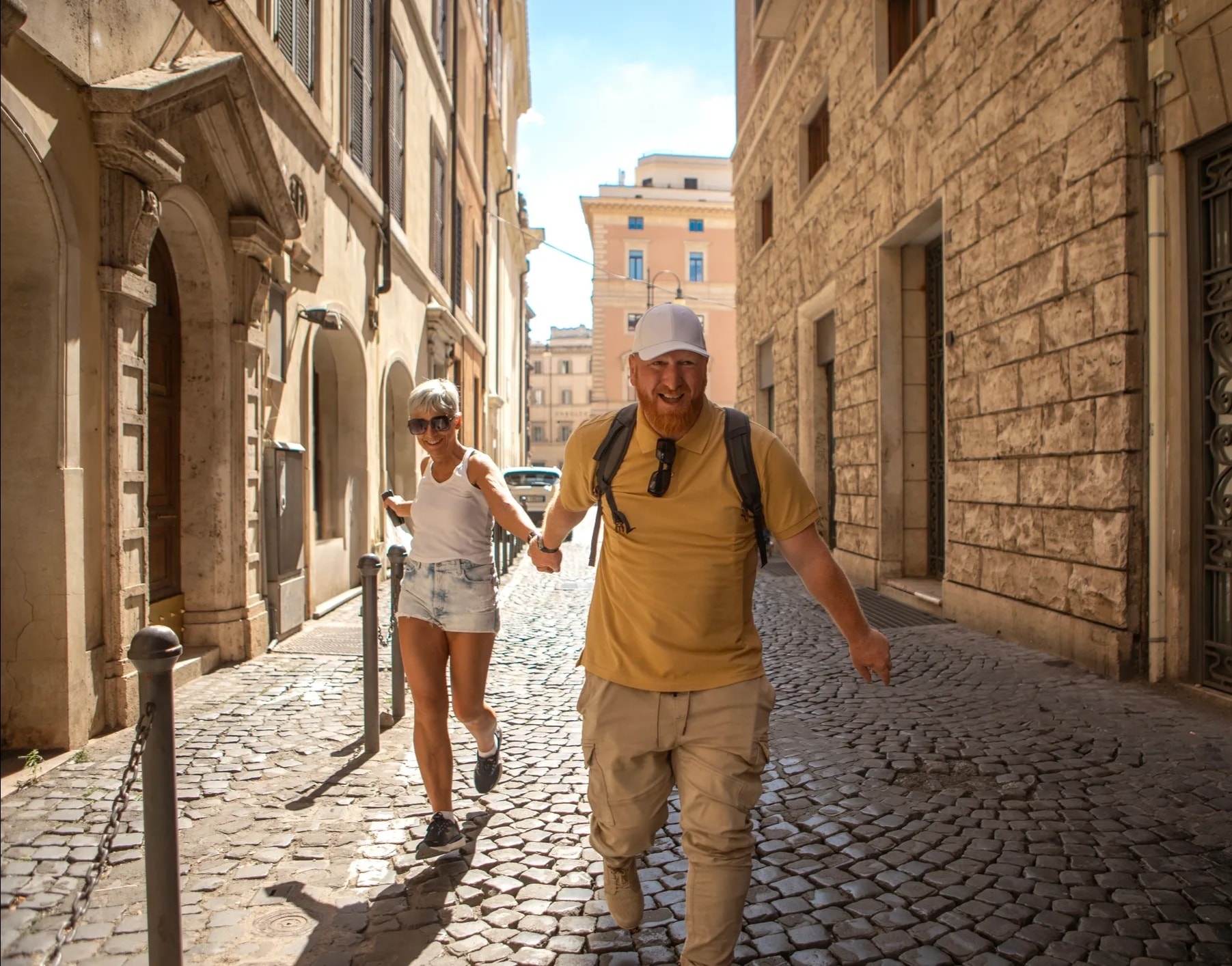 Couple exploring ancient European city streets